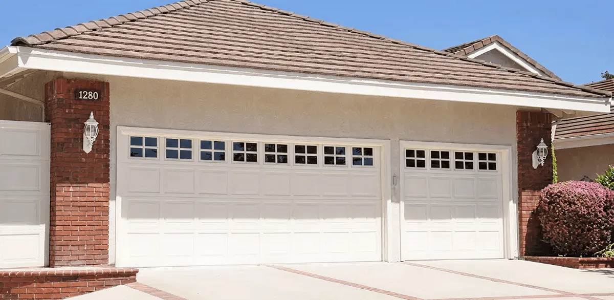 Residential garage door repair service for a double garage door in Tempe, AZ